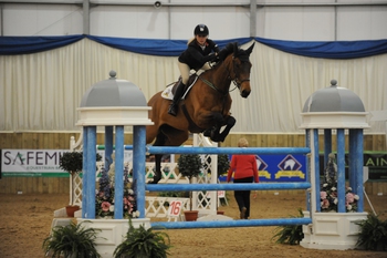 Suffolk Showjumper Chloe Winchester takes the Grand Prix at the Blue Chip Championships 2014